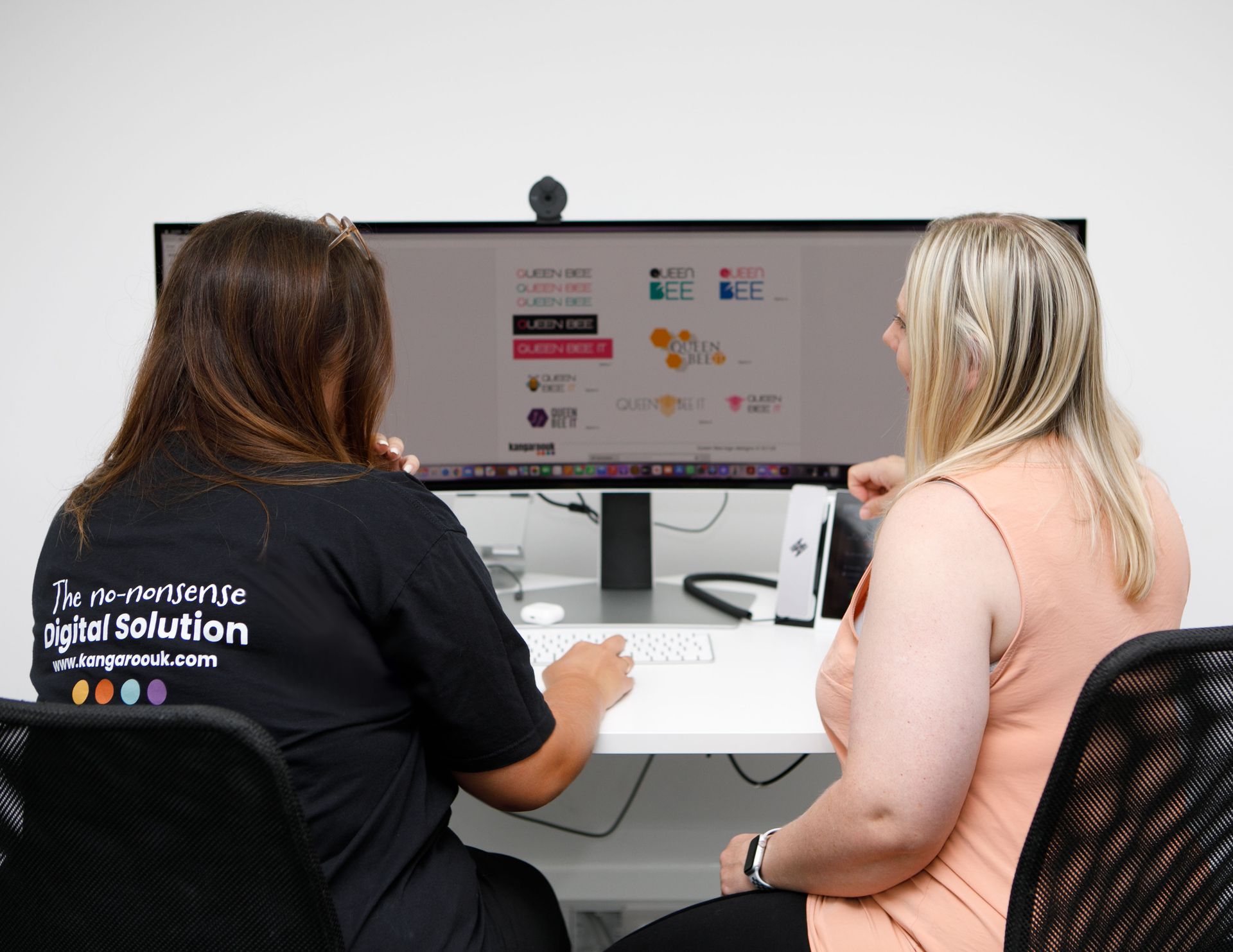 Man at desk with computer, searching 
