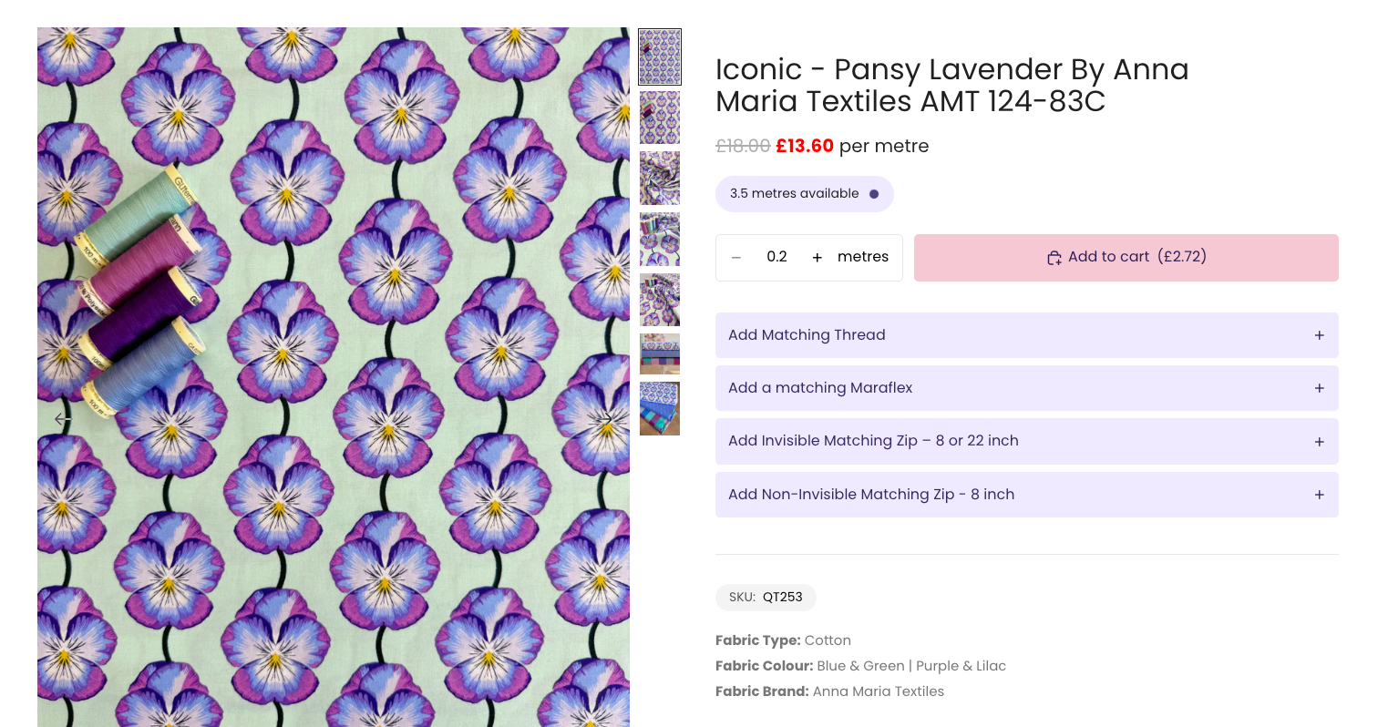 Green perfume bottle on a shelf with a mirror and plants, golden accents.