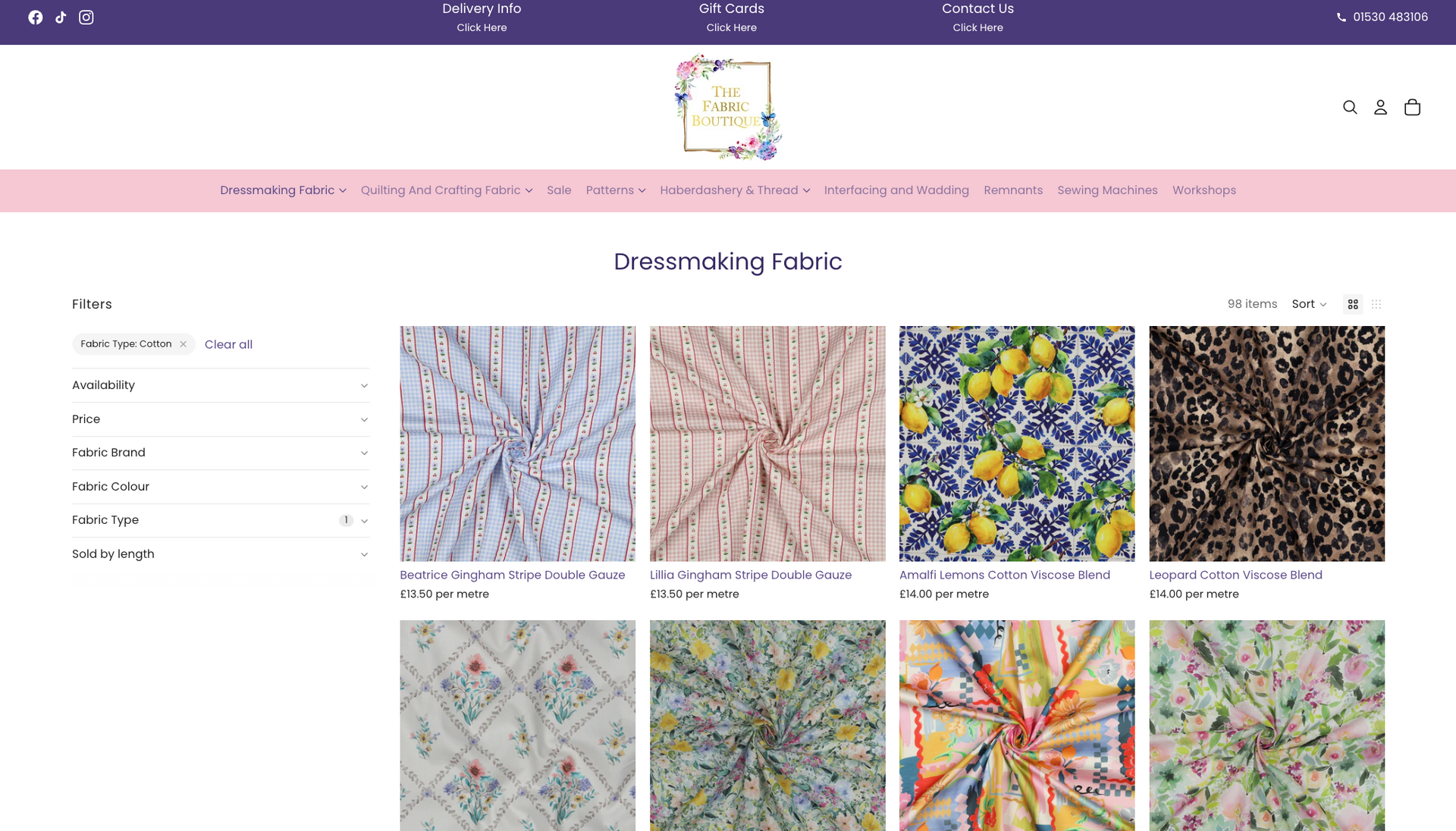 A pink perfume bottle with