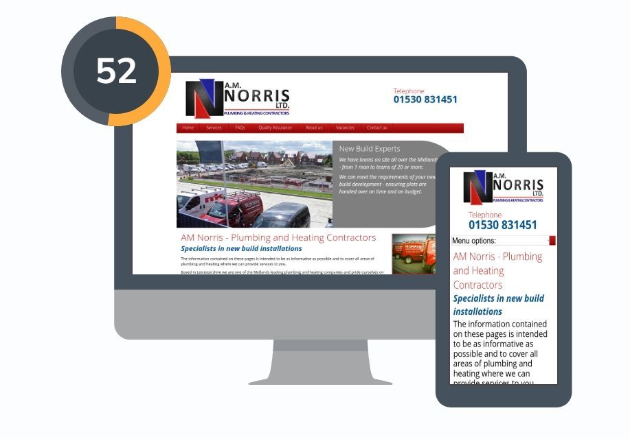 Man and woman looking at laptop in front of a green wall with plants; smiling.