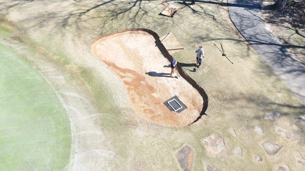 An aerial view of a playground in a park.