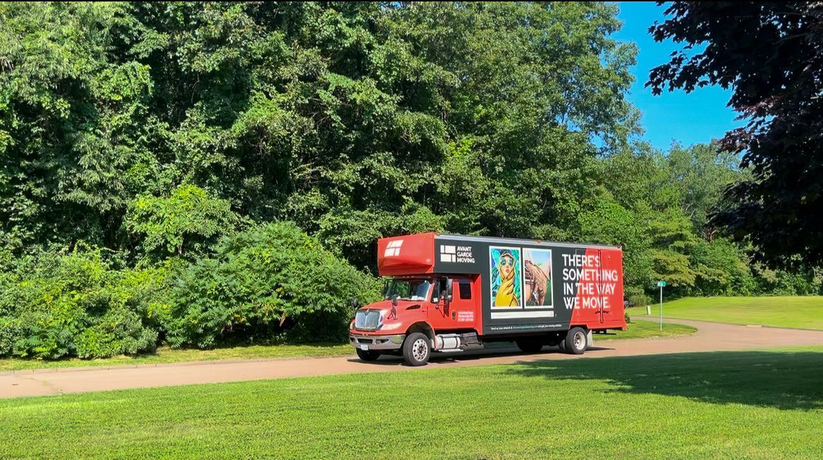 Avant-Garde Moving truck parked in front of a Connecticut home, ready for a luxury move