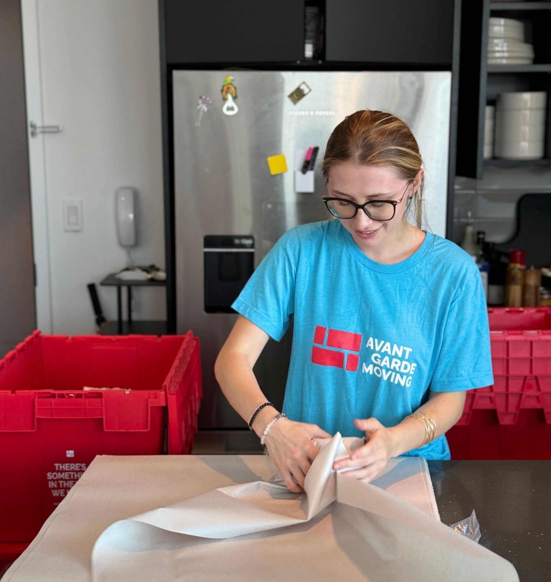 avant-garde packer packing up kitchen