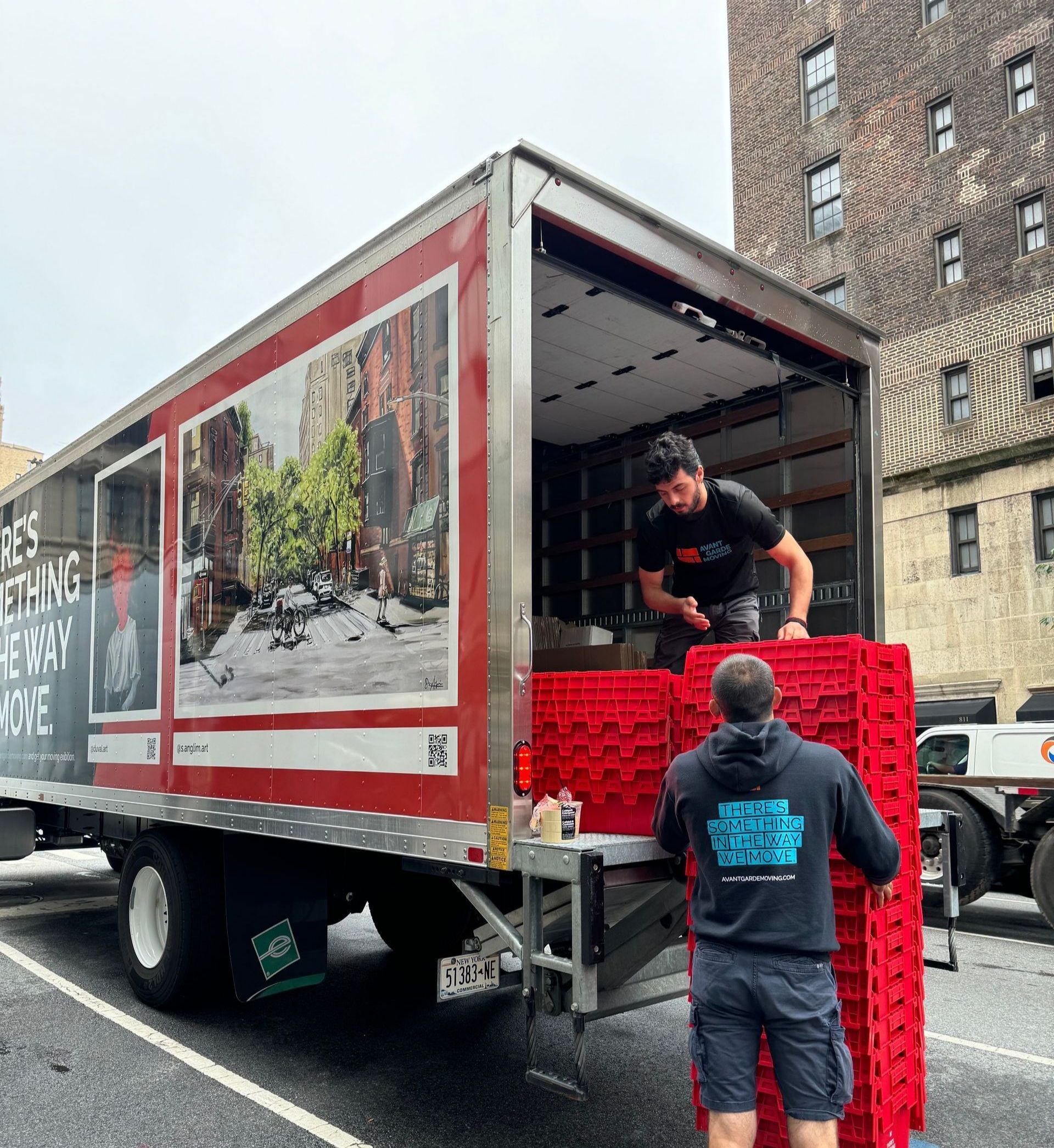 Avant-garde mover taking in boxes and moving & packing materials into the customers house on Upper East Side, Manhattan