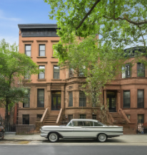 Photo of a street and a brownstone in Fort Green Area