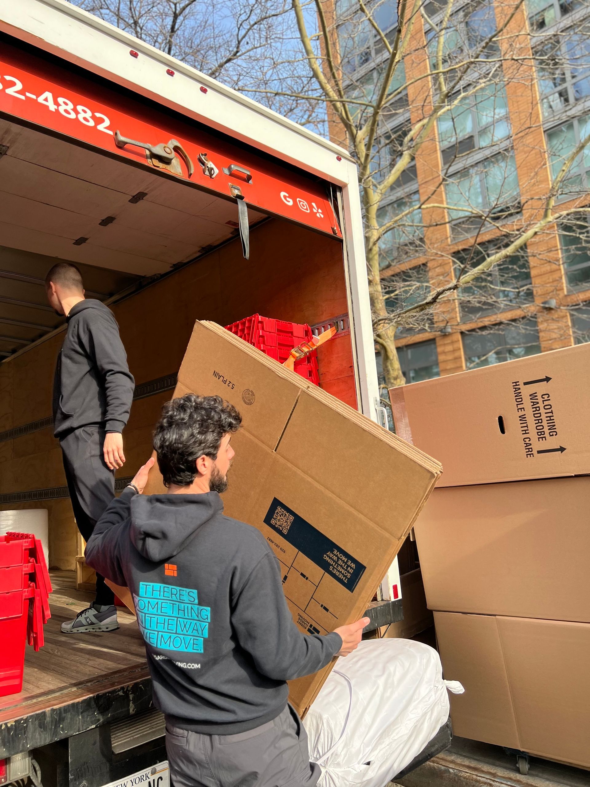 two movers handling furniture