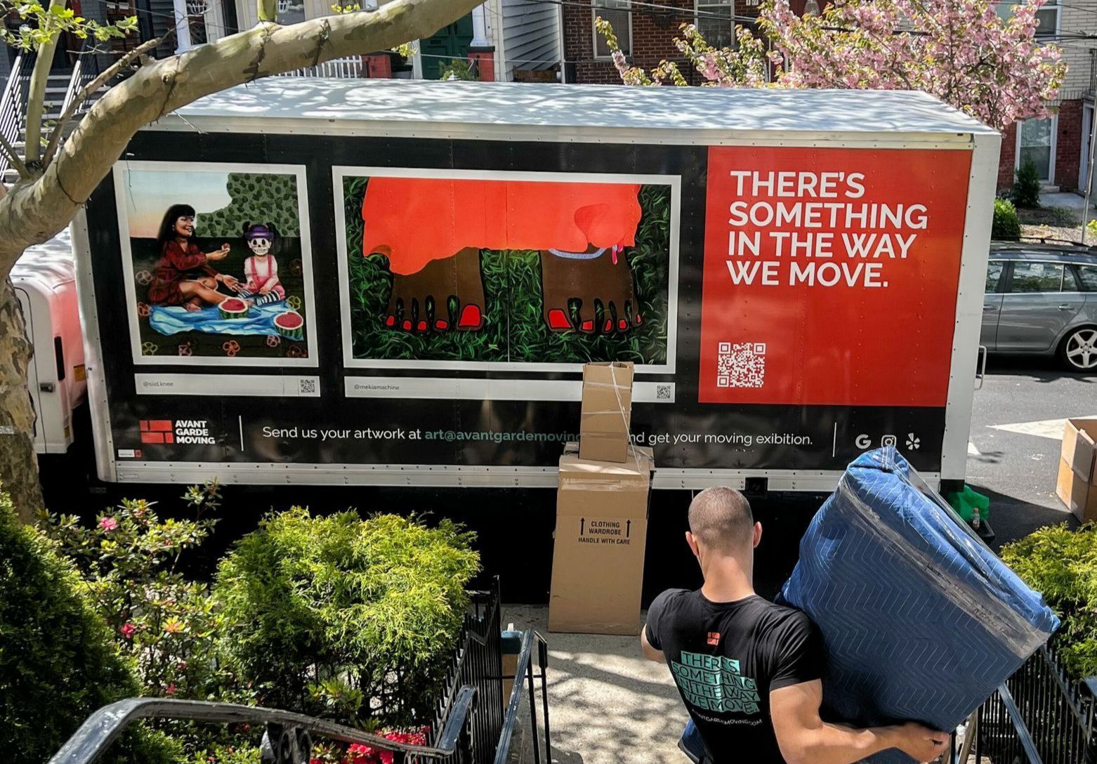 Avant-Garde mover taking out protected and packed furniture out of the Brooklyn brownstone house 