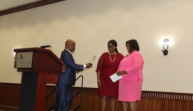 Kim Thompson, Human Resources Director, receives Patty Lee Gilbertson Award from our Executive Director and Hampton City Councilman Brown