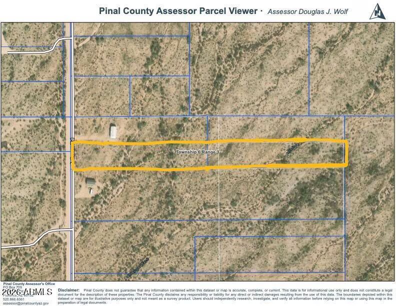 A Pinal County Assessor parcel map showing a highlighted rectangular plot of land alongside a road.