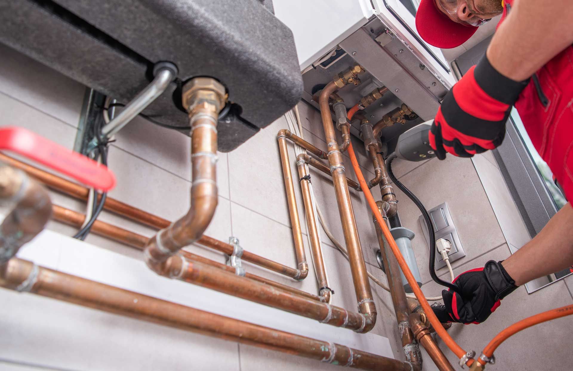 Specialist from Air Control Company working on heating replacement installation at client's house in Nicholasville, KY