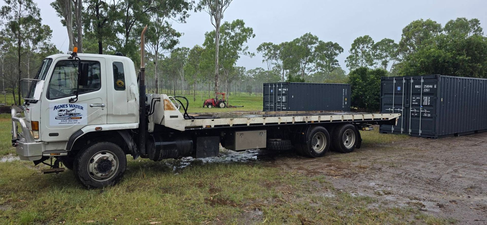 White Flatbed Truck Carrying Shipping Containers — Agnes Water Transport and Towing in Agnes Water, QLD