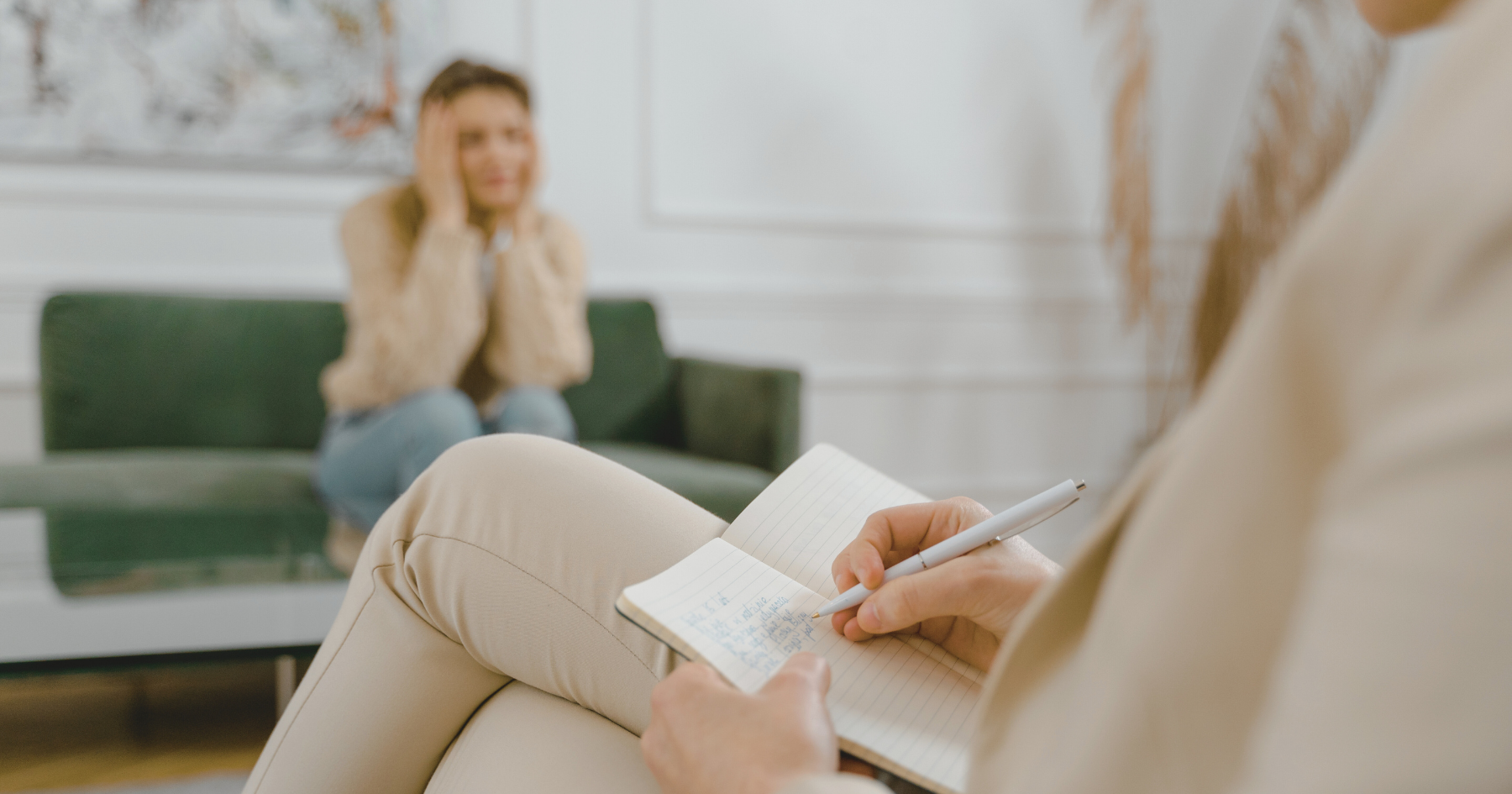 young woman sitting across from therapist for the first time