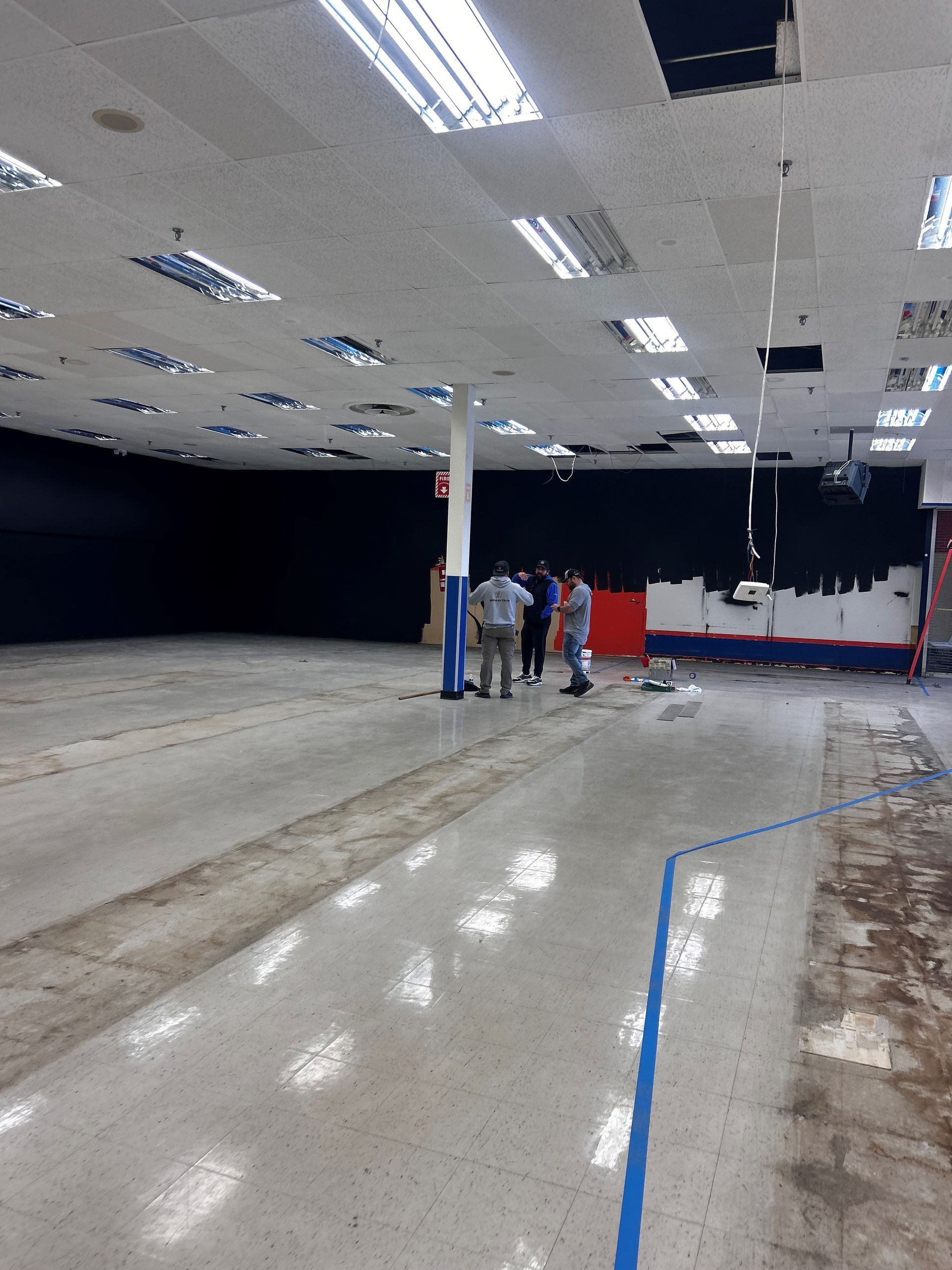 A man is swinging a golf club on a golf course.