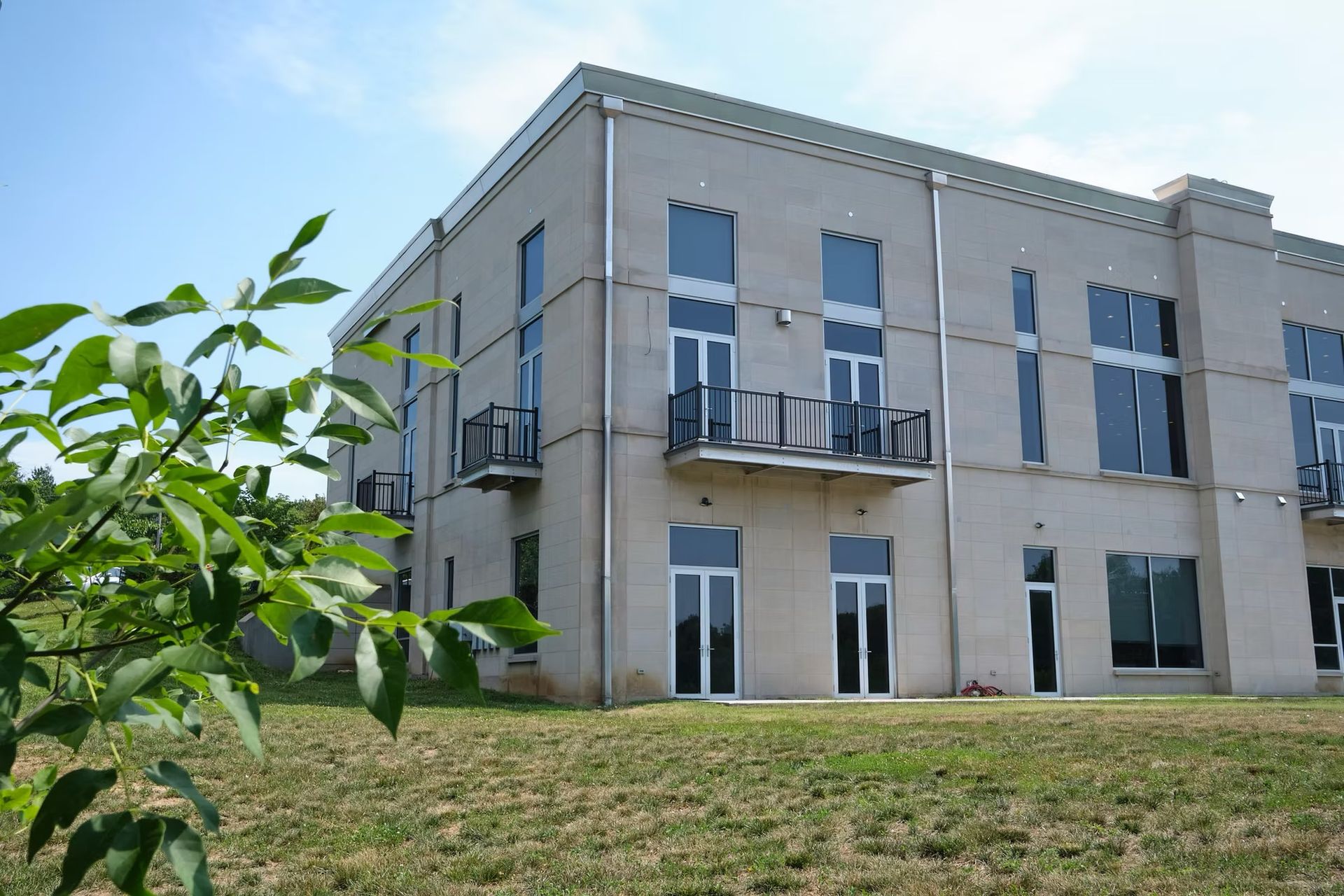 A large building with a lot of windows and balconies