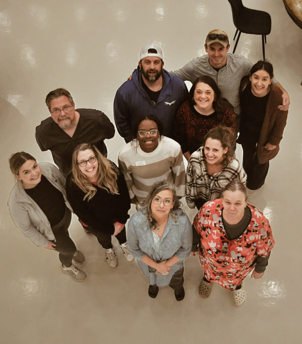 A group of people are posing for a picture together