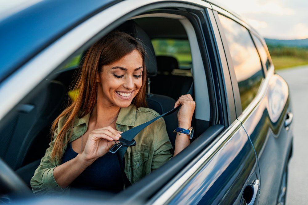 Woman Inside Car Wearing Seatbelt — Scottsdale, AZ — J.B. Martin Insurance Agencies