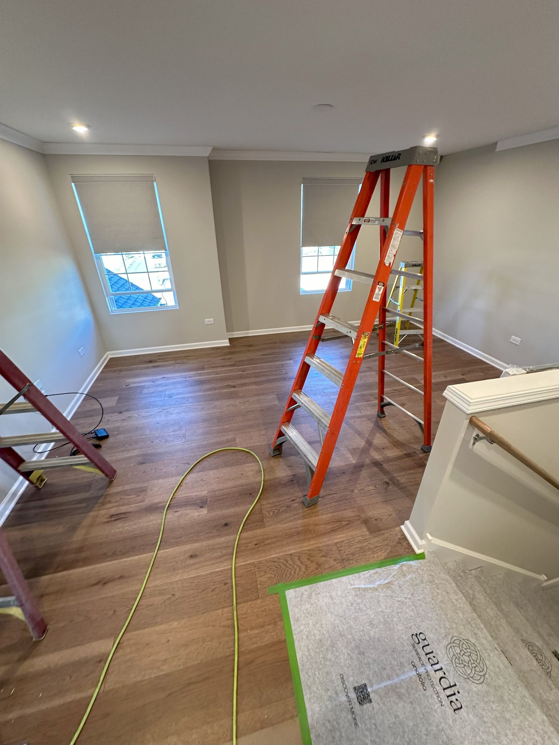 there is a ladder in the middle of the room .