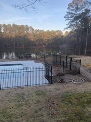 Swimming Pool With Fence — Covington, GA — Barbara's Fence Company, Inc.