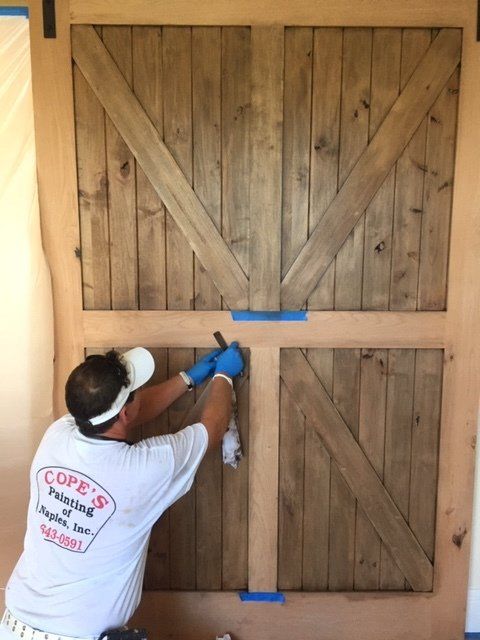 Painting the Wood Doors — Naples, FL — Cope's Painting Of Naples, Inc.