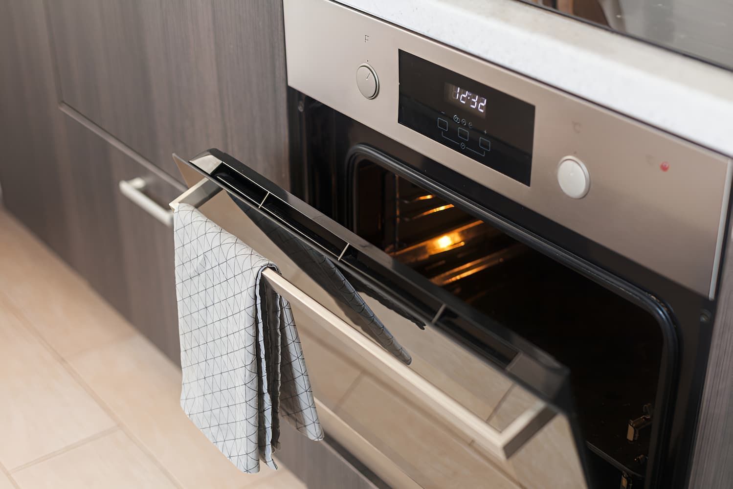 A Stainless Steel Oven With The Door Open — GPS Plumbing, Drainage & Gasfitting In Dubbo, NSW