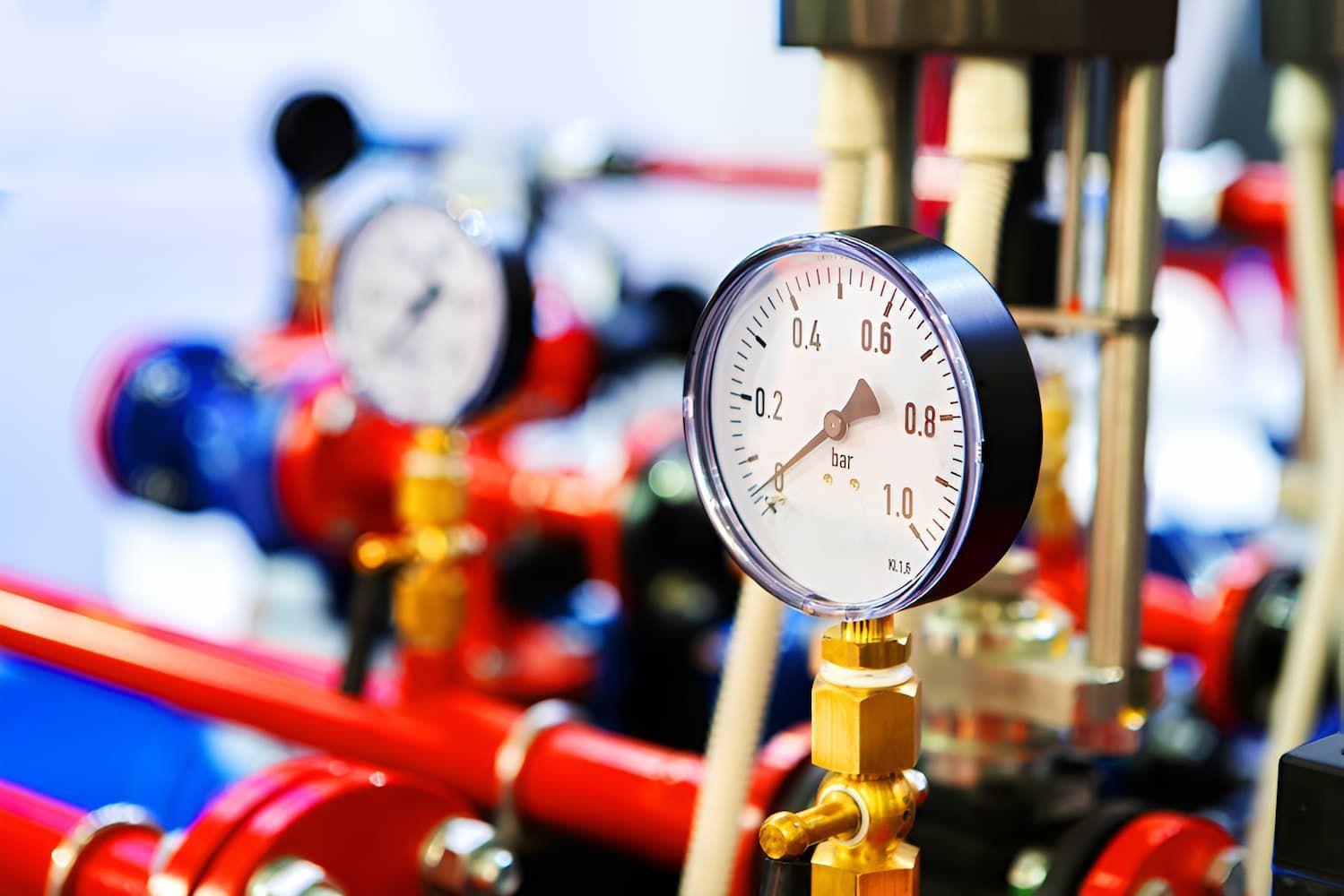 A Close Up Of A Pressure Gauge On A Pipe In A Factory — GPS Plumbing, Drainage & Gasfitting In Dubbo, NSW
