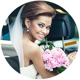 A stunning bride in one of our wedding vehicles
