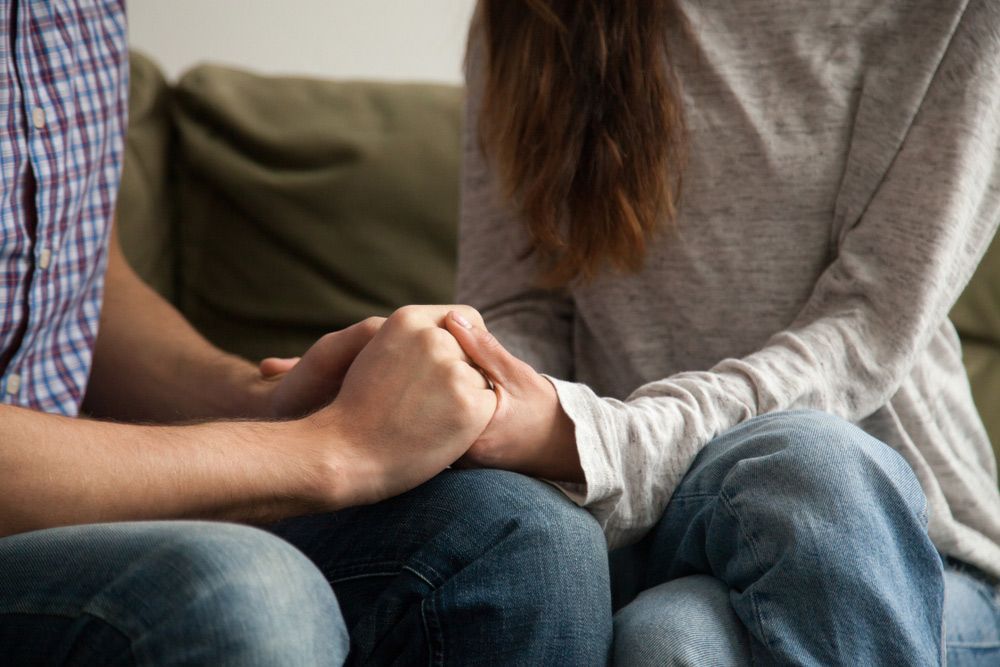 Close Up View Of Couple Holding Hands — Gold Coast Detox and Rehab Services in Brisbane, QLD