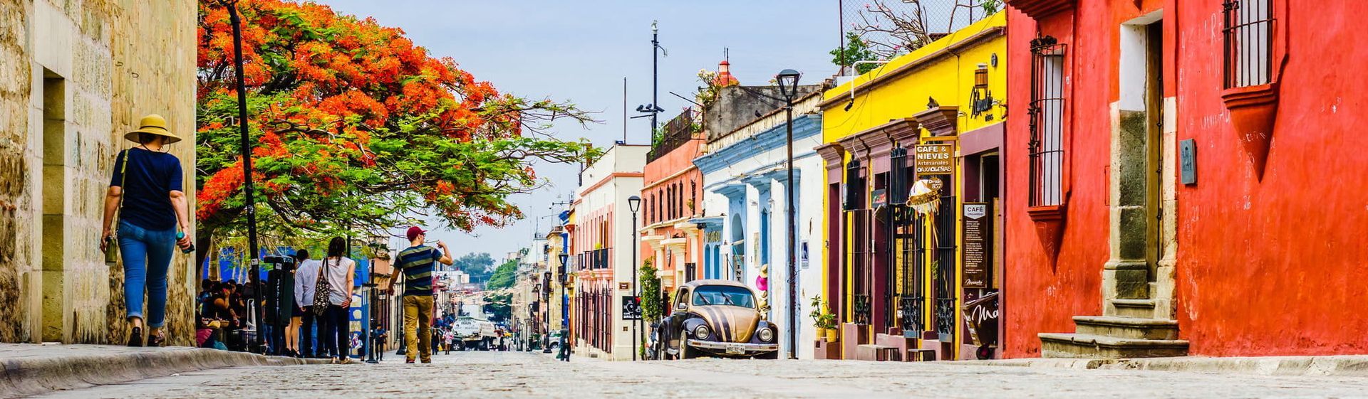 A Painting of A Narrow Street Lined with Colourful Buildings — Gold Coast Detox and Rehab Services in Gold Coast, QLD