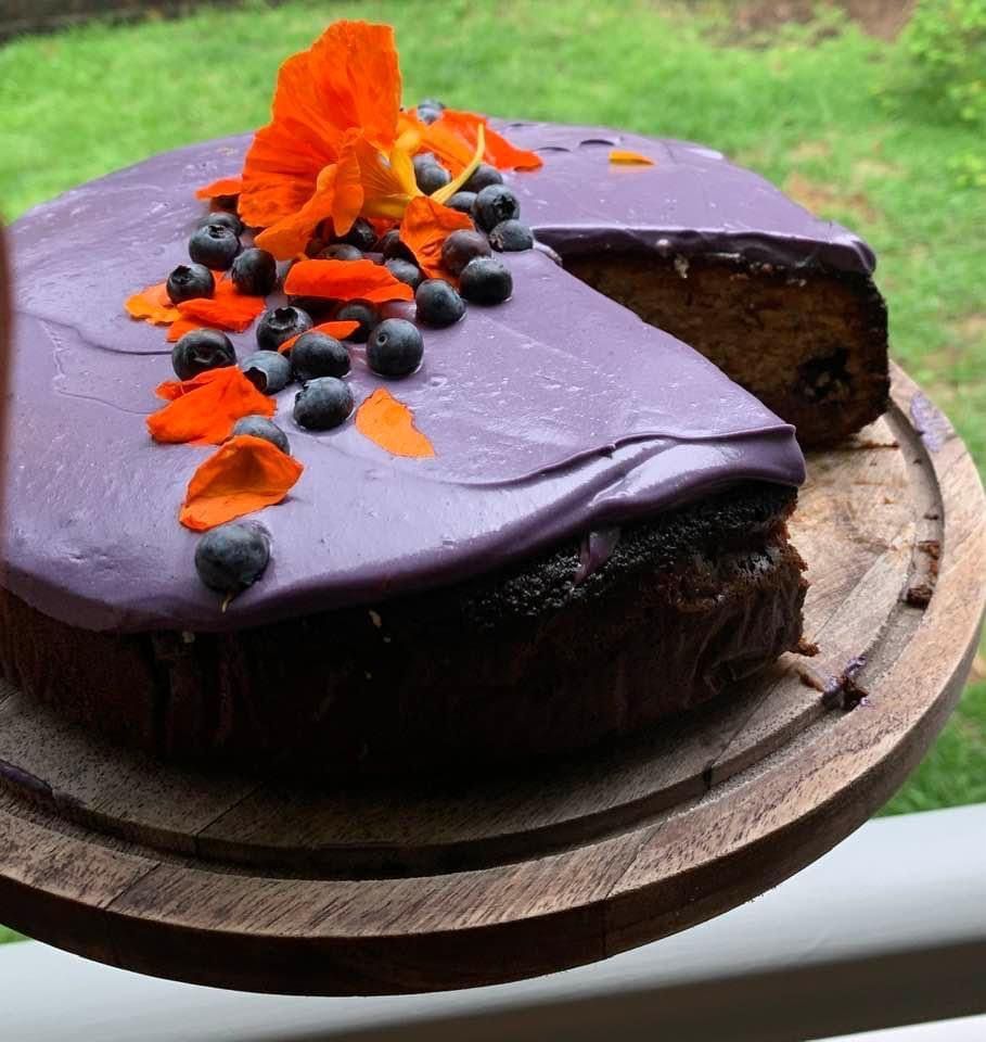 A Purple Cake With a Slice Taken Out of It — Gold Coast Detox and Rehab Services in Gold Coast, QLD