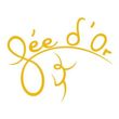 Logo en écriture jaune : « Fée d’Or » au-dessus d’une ligne courbe avec une forme figurative abstraite.