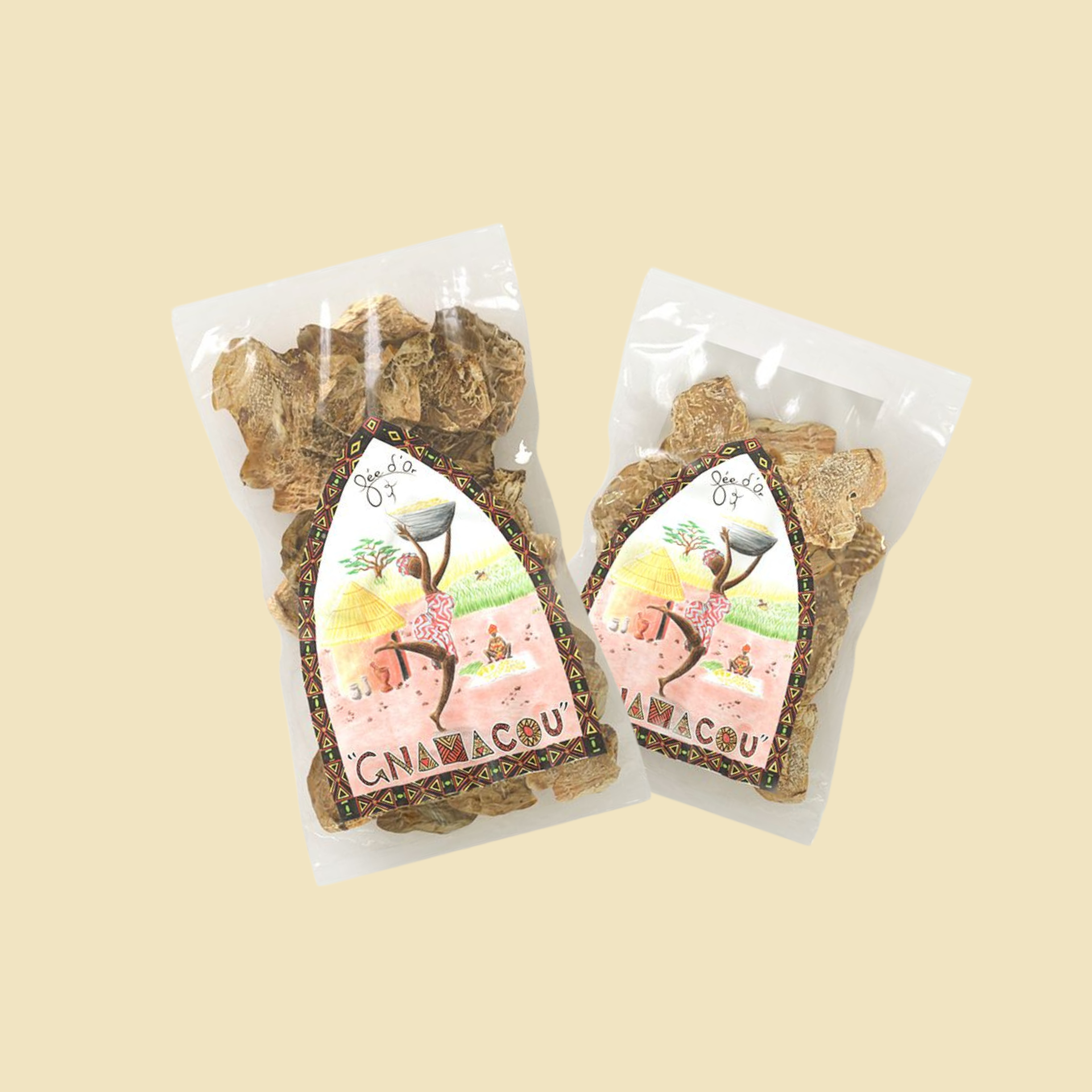 Deux paquets de bonbons Gnamacou dont les étiquettes représentent une personne portant un panier, sur fond beige.
