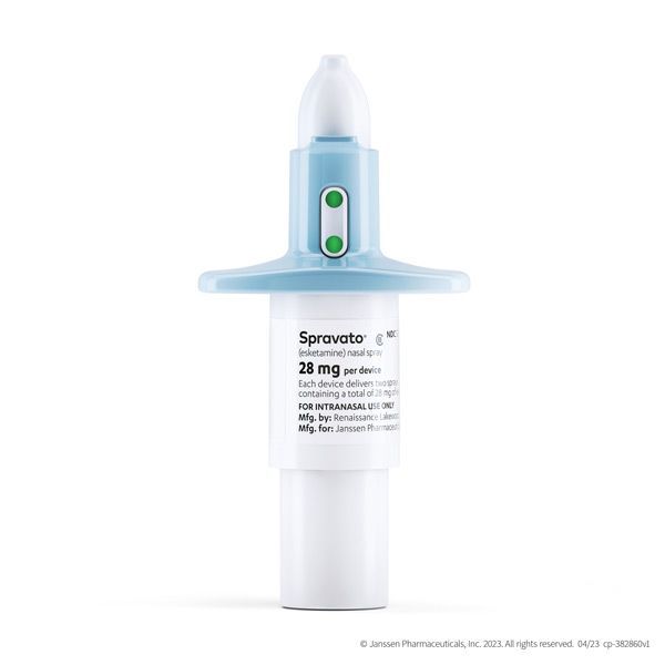 a nasal spray bottle is sitting on a white surface with the title of Spravato®