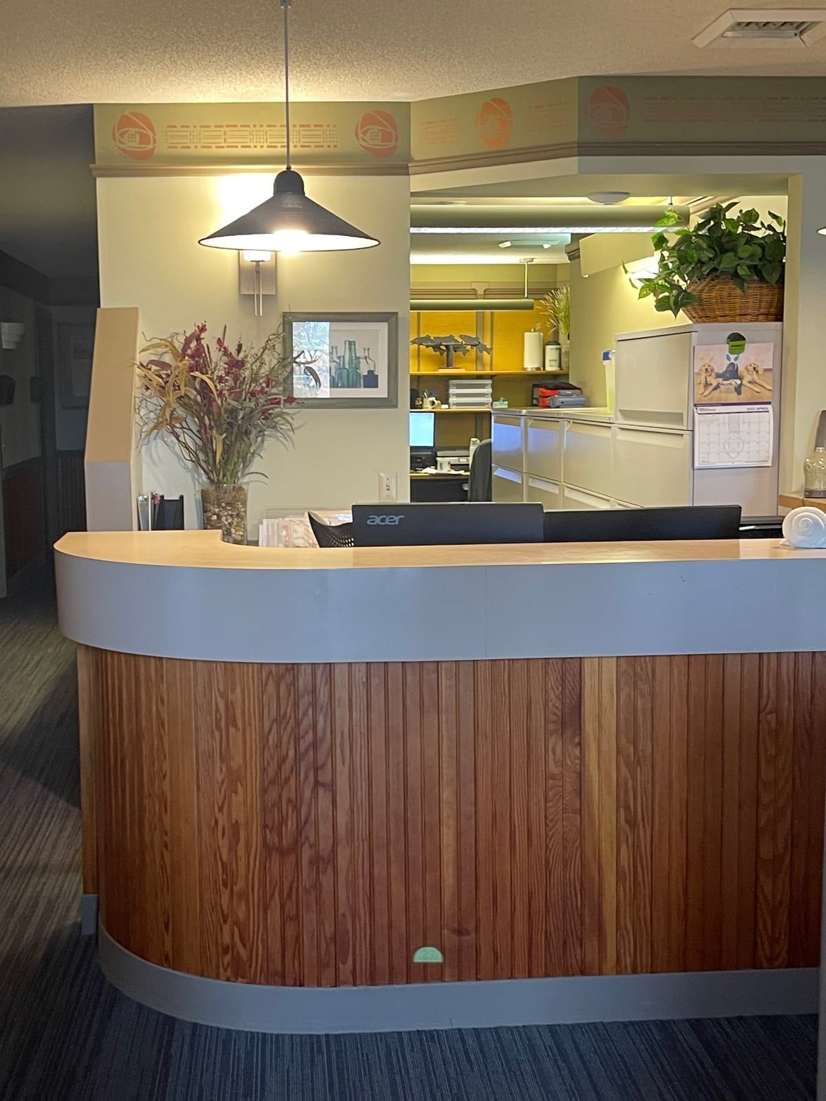 a reception desk with an acer computer on it located in carbondale Illinois