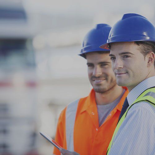 Two men in hard hats