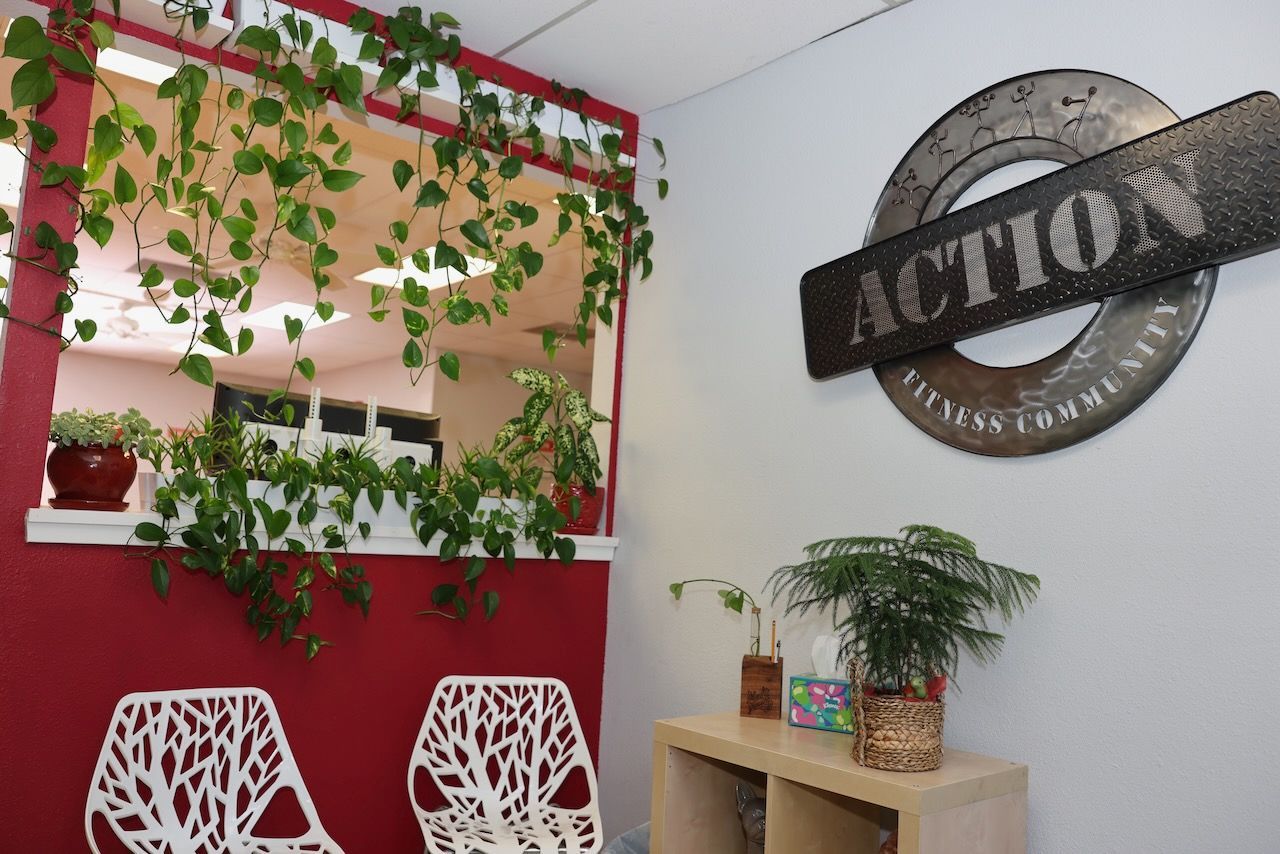 A room with a sign that says action on it