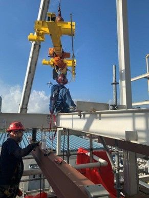 Two Men On The Massive Metal Structure — Crosby, TX — Advanced Overhead Crane Services Two Men On The Massive Metal Structure — Crosby, TX — Advanced Overhead Crane Services