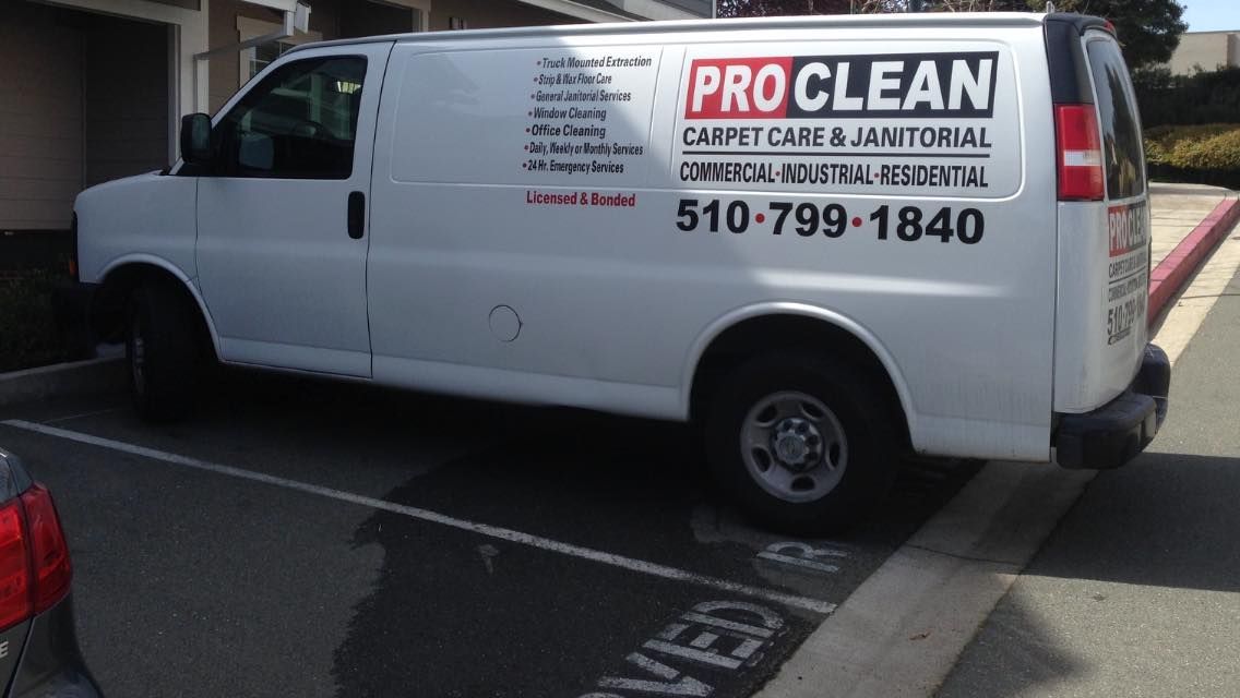 A proclean van is parked in a parking lot