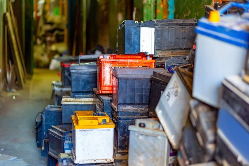 Pile of Used Car Batteries, Stacked Haphazardly — Central Scrap Metal in Sunshine Coast, QLD