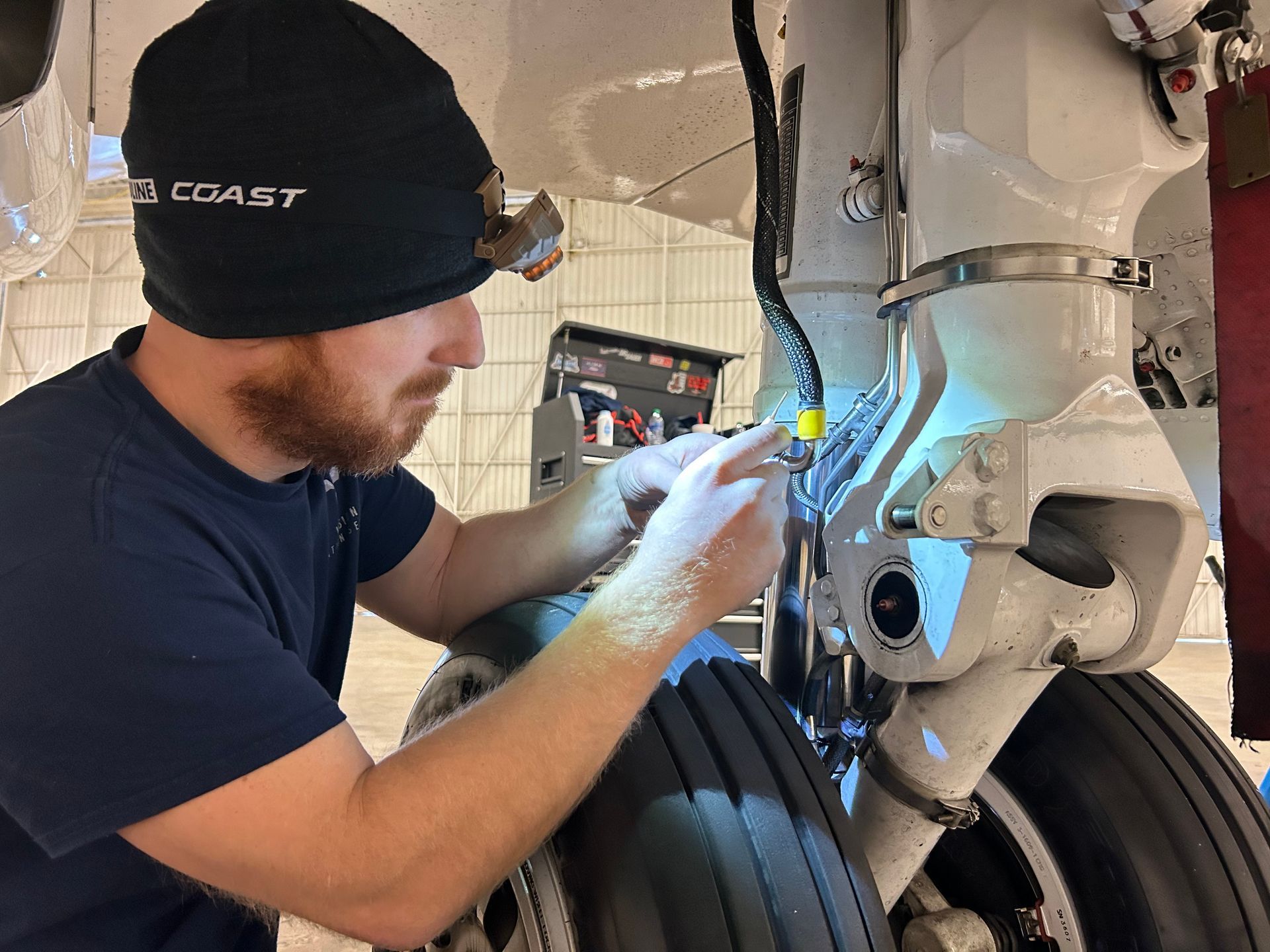A man working on a plane