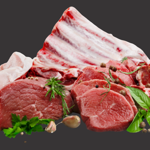 A pile of raw meat and vegetables on a table.