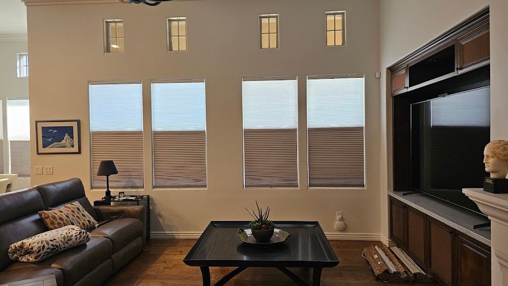 A living room with a couch and a coffee table
