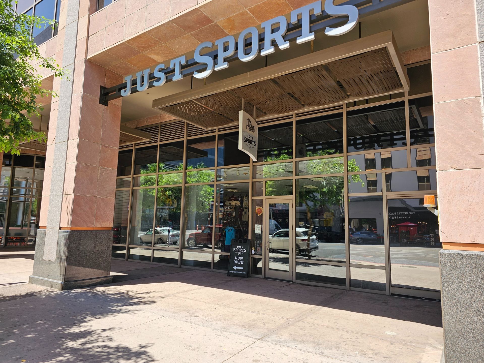 A building with a sign that says just sports