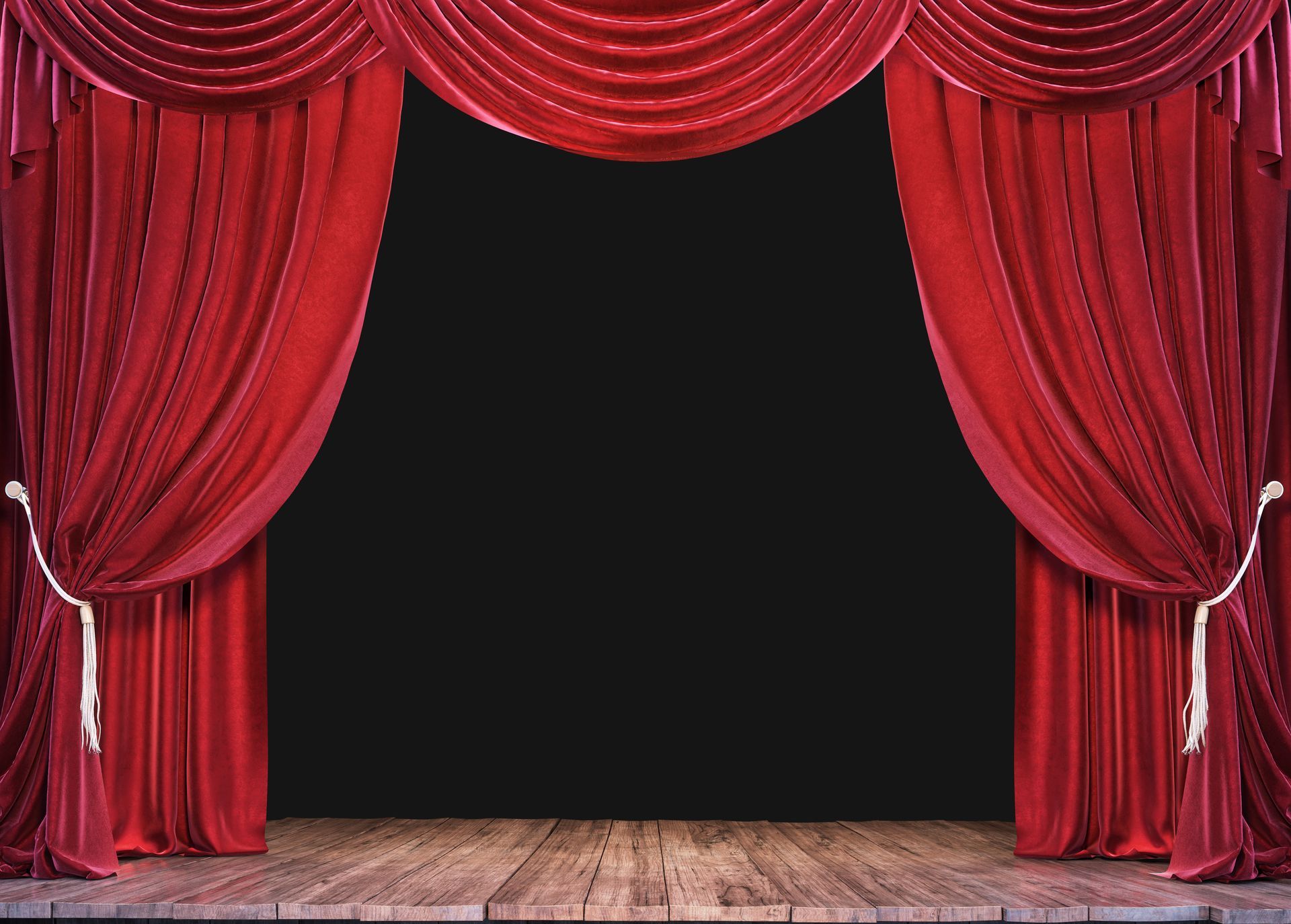 A stage with red curtains and a wooden floor.
