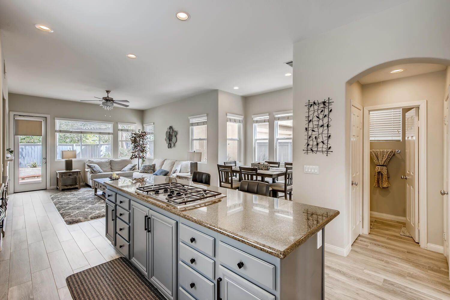 A kitchen with a large island in the middle of the room.