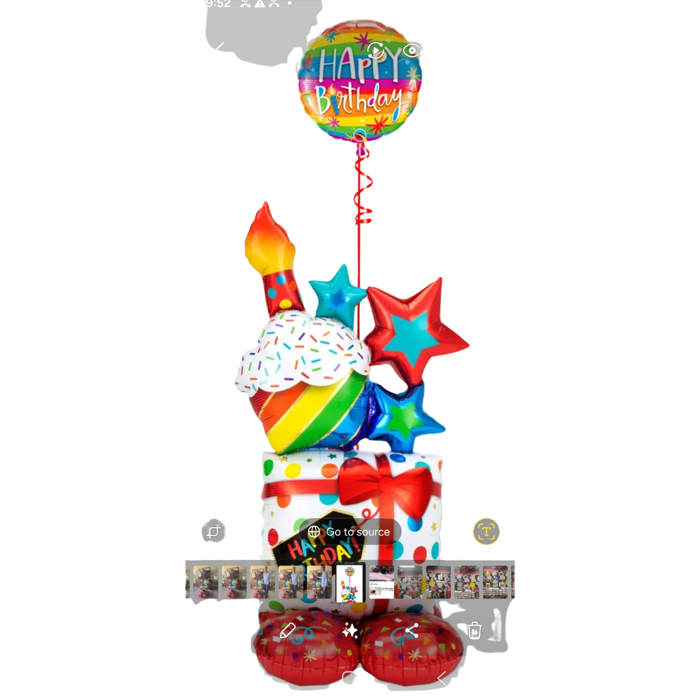 Colorful birthday balloon arrangement with gift box, cupcake, and star balloons.