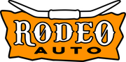 a logo for rodeo auto with a bull 's horns on it .