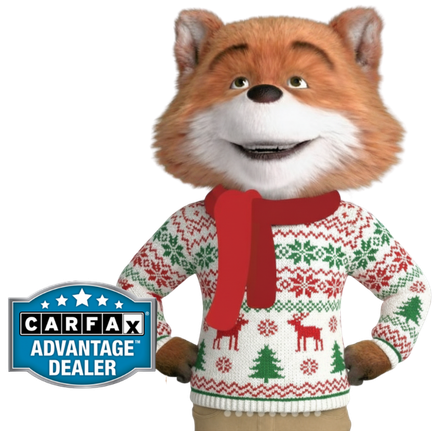 a fox holding a carfax lifetime dealer sign