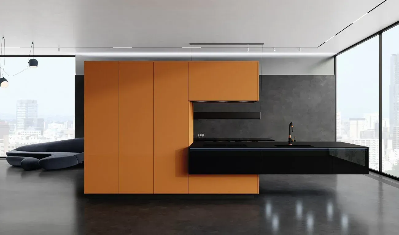 Modern kitchen with orange and black cabinets, large windows, and cityscape views.