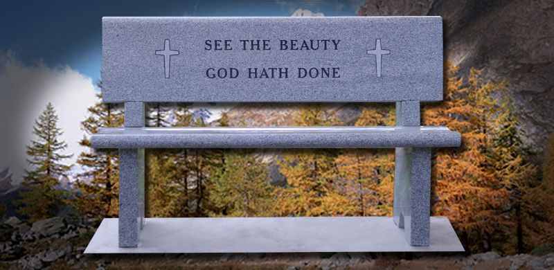 Stone bench with cross symbols and inscription 