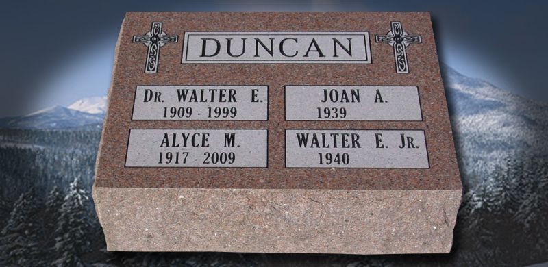 Headstone for the Duncan family: Dr. Walter E., Alyce M., Joan A., and Walter E. Jr. with cross motifs and mountain backdrop.